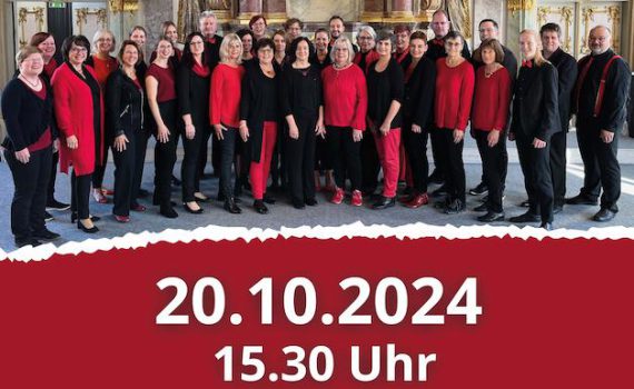 Rotes Chor VoiceNet Plakat für Konzert im kleinen Goldenen Saal am 20.10.2024 um 15.30 Uhr, mit dem Bild vom Chor in schwarz und Rot im Goldenen Saal vom Konzert dort im Jahr davor